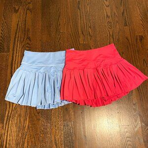 2 Gold Hinge Pleated Tennis Skirts